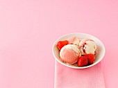 Close up view of ice cream with fresh strawberries