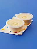 Vanilla ice cream in plastic bowls