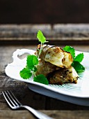 Cabbage roulade with mint leaves