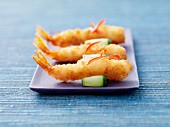 Prawn tempura on cucumber slices