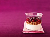 Berry compote with cereals and cream