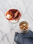 Greek yogurt with plum compote and almond muesli