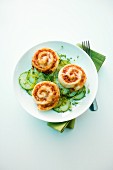 Pizza whirls on a cucumber salad