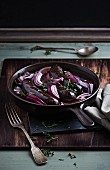 Black pudding with red onions and thyme