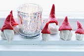 Festive arrangement of marzipan gnomes