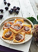 Flaky pastries with plums