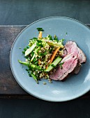 Roast lamb with a grain a vegetable mix