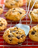 Chocolate chunk cookies on a cooling rack