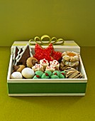 Various Christmas biscuits in a gift box
