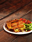 Toad in the hole with beans and tomatoes