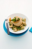 A vol-au-vent filled with chicken and peas