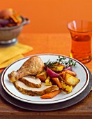 Freshly roasted turkey with root vegetables