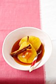 Poached pears in cinnamon and orange juice
