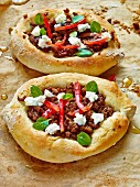 Minced lamb and feta cheese pizzas