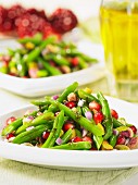 Bean salad with pistachios and pomegranate seeds