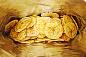 A bag of dried banana chips (seen from above)
