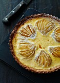 Pear tart with a cream and egg topping