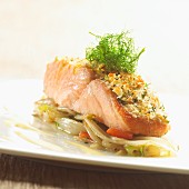 Salmon fillet with a herb crust on a bed of chicory
