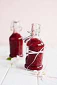 Two bottles of berry smoothie