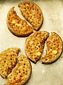 Buttered crumpets, halved