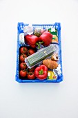 Vegetables and convenience food in a shopping basket