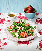 Rocket salad with strawberries and ricotta