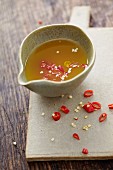 Salad dressing with turmeric and chilli peppers