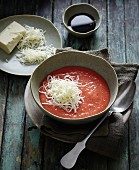 Tomato soup with pointed peppers and cheese