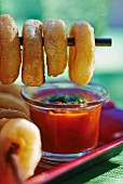 Squid rings with a spicy tomato and pepper dip