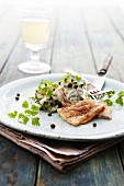 Cod fillet with tzatziki, capers and chervil