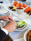 A man eating Waldorf salad at Thanksgiving