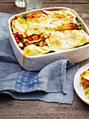 Green kale lasagne with salsicce