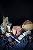 A selection of cheeses with figs