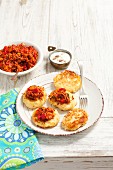 Potato and sauerkraut cakes with minced meat sauce