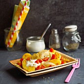 Gnocchi with fennel, tomatoes and soya yoghurt