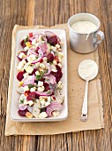 Herring salad with beetroot, onion, apple and mayonaise