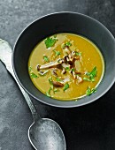 Cream of mushroom soup with curry and parsley