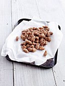 Roasted almonds on parchment paper