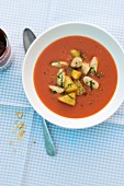 Spicy tomato soup with chicken and pineapple
