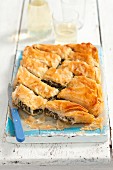 Spanakopita (puff pastry pie with spinach and sheep's cheese, Greece)
