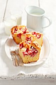 Three slices of yeast dough cake with strawberries