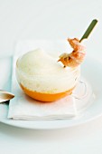 Crab cappuccino with a langoustine skewer