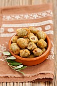 Breaded fried olives filled with anchovies