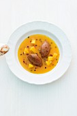 Mango and passion fruit soup with chocolate cream