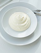 Mascarpone cream on a white plate