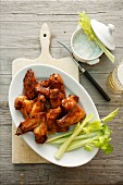Chicken wings with celery and a dip