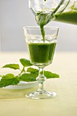 A smoothie made with pineapple, stinging nettles, kohlrabi and chilli