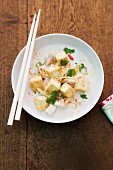 Coconut milk soup with tofu, chicken and coriander