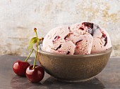 A bowl of cherry ice cream
