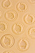 Shortcrust pastry stamped with cupcake motifs